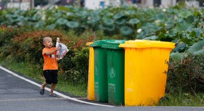 Китайцев арестовывают за контрабанду мусора